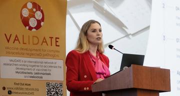 Viktoria Bodnarova giving the Day One keynote talk at the VALIDATE Annual Meeting 2026 