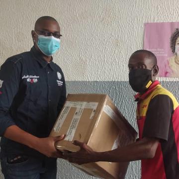 Handover of Lab Coats box handover