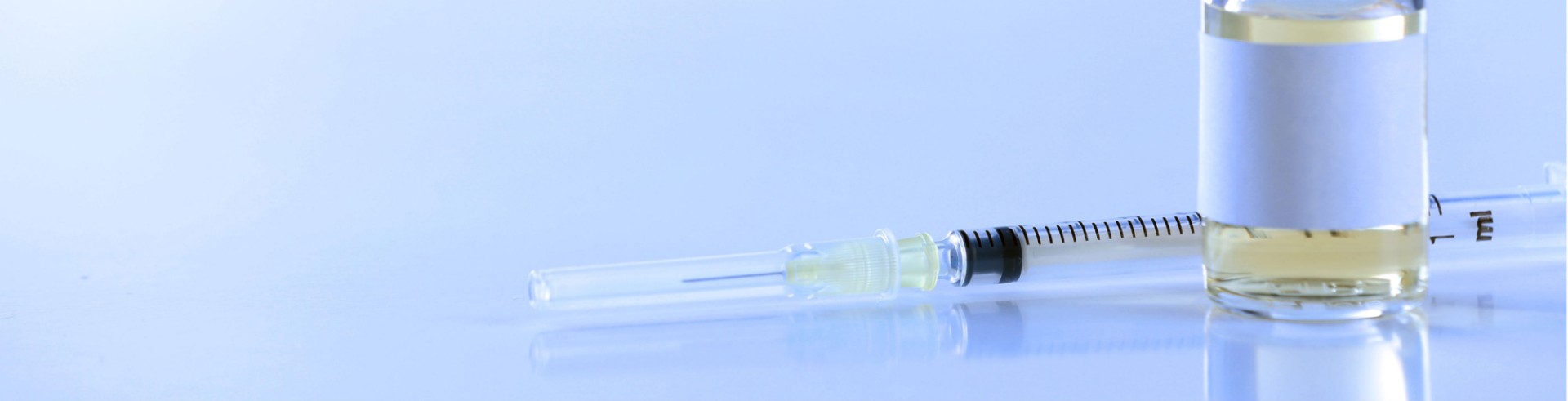 Vaccine vial and syringe