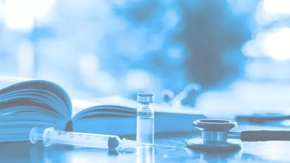 Vaccine vial with syringe