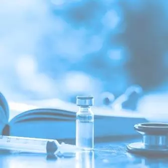 Vaccine vial with syringe
