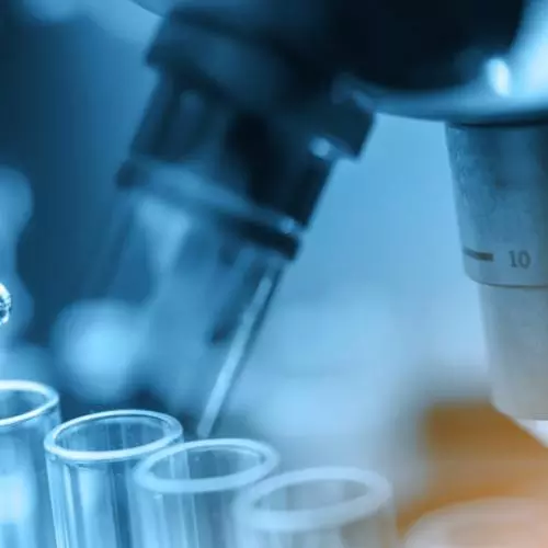 lab microscope and test tubes