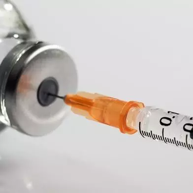 Vaccine being drawn