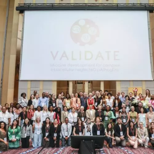 The VALIDATE Annual Meeting 2024 - A group photo of all delegates below the VALIDATE Logo