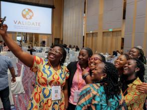 Lydia (left) with colleagues at the VALIDATE Annual Meeting 2024